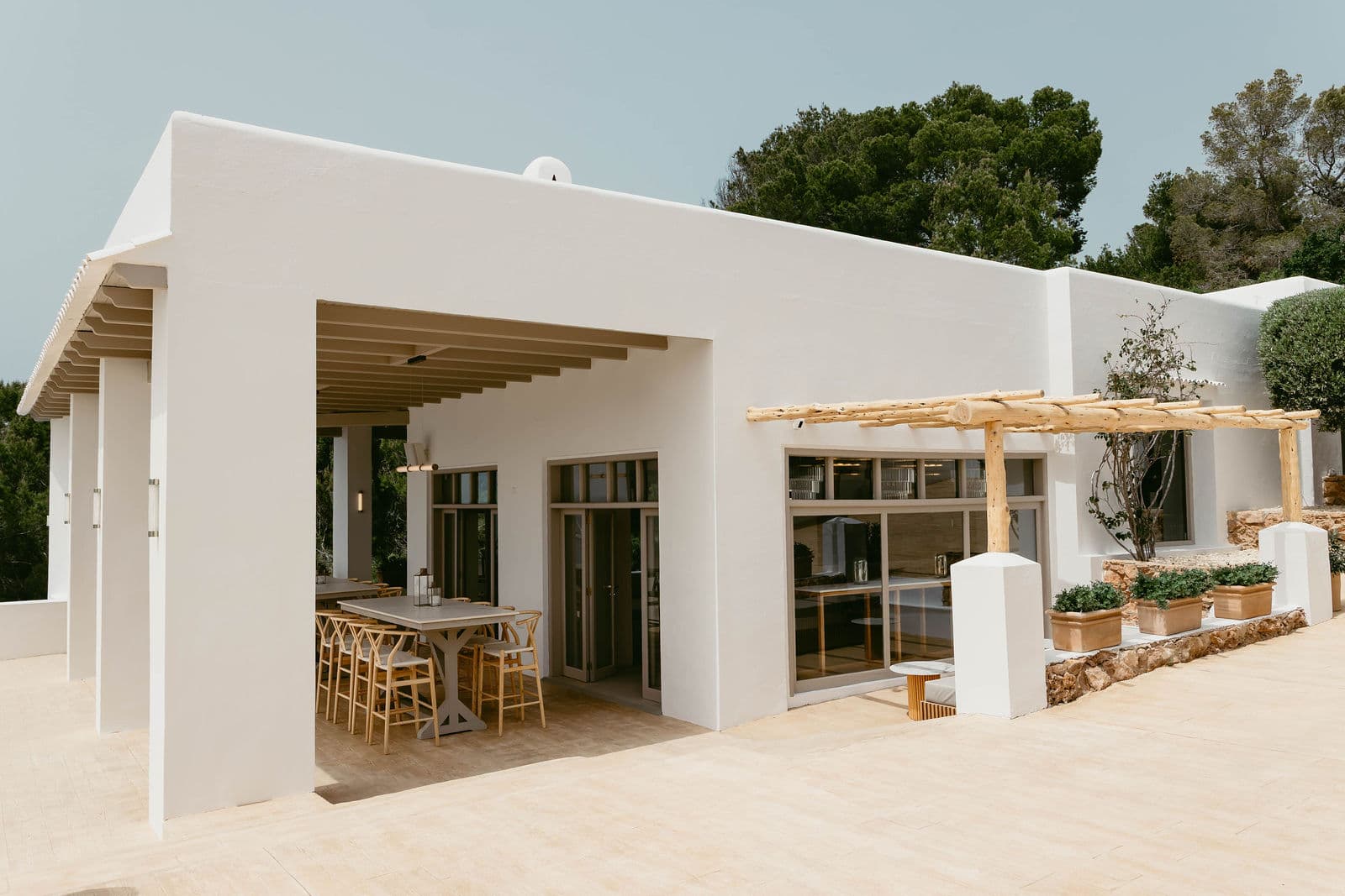 Elixir Ibiza Mediterranean white architecture with wooden pergola and terrace