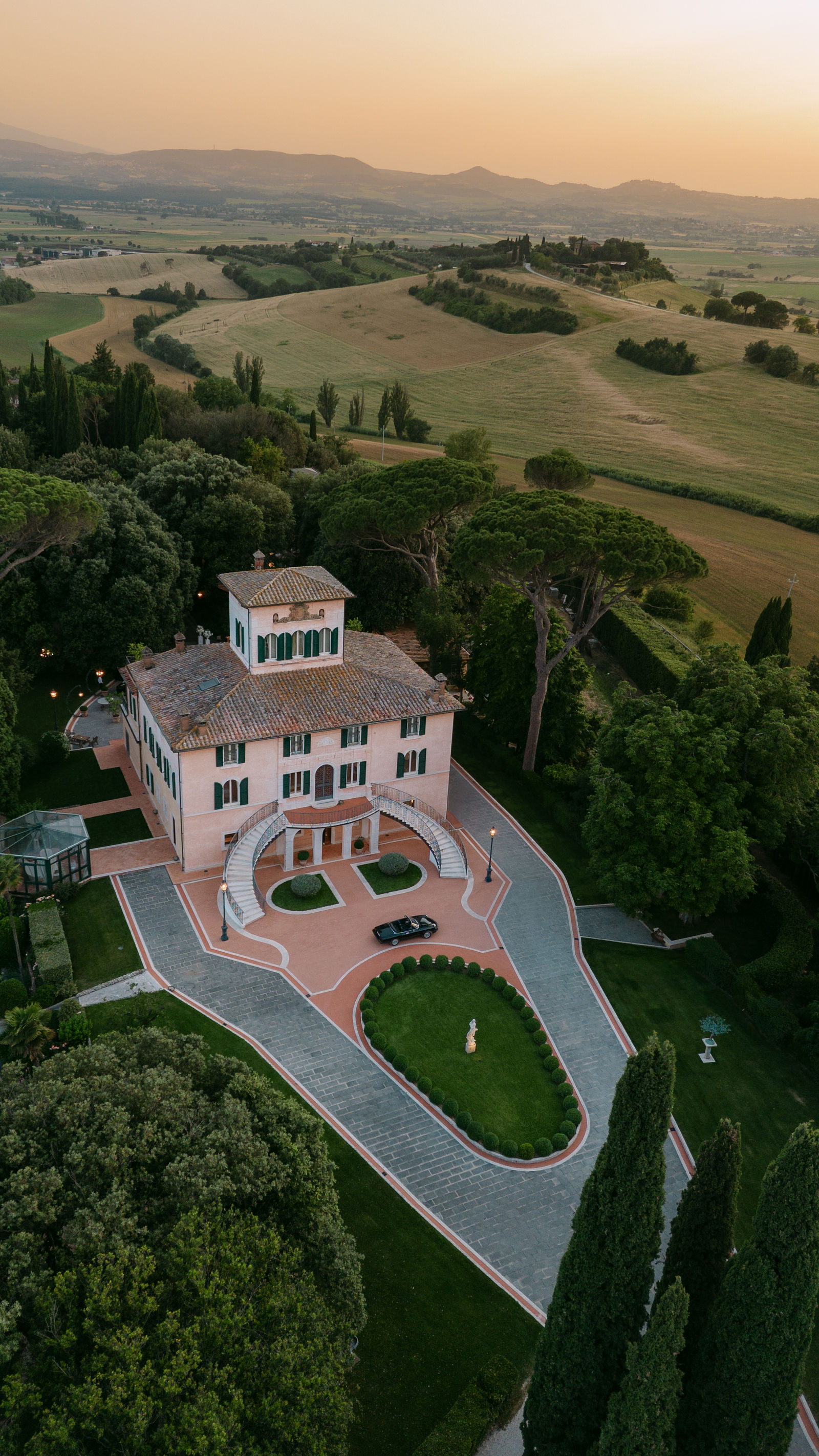 Aerial view of luxury Ibiza wedding villa at golden hour